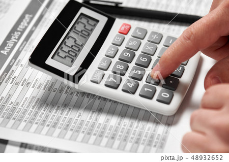 Businessman working and calculating finance. Businessman working and calculating finance. 48932652