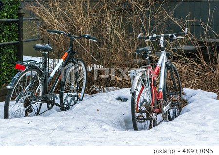 Bikes in the snow. Bikes in the snow. 48933095