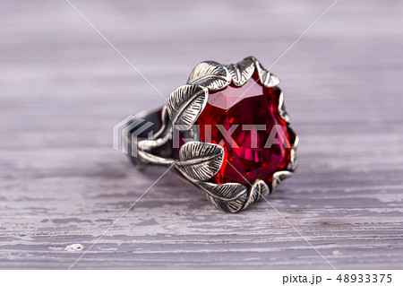 A ring in a silver frame in the form of leaves A ring in a silver frame in the form of leaves 48933375
