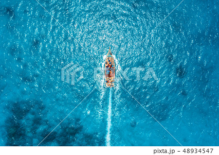 Aerial view of the fishing boat in the sea 48934547