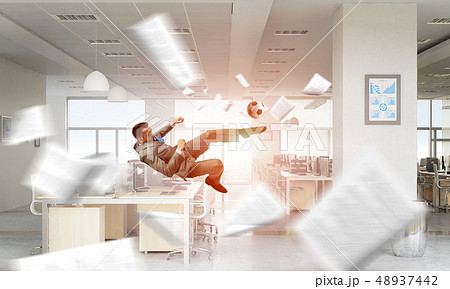 Playing ball in office Playing ball in office 48937442