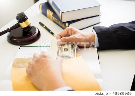 Lawyer being offered receiving money as bribe from 48939939