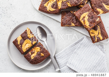 Vegan brownie with peanut butter on white 48941887