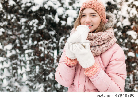 Portrait of a beautiful young girl in white  48948590