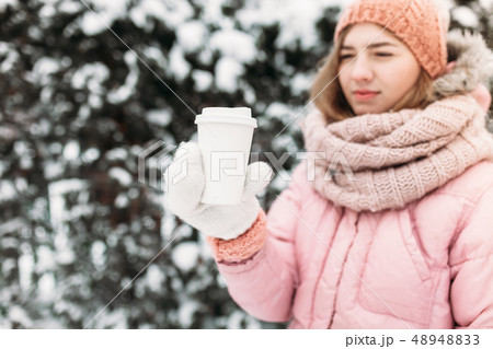 Portrait of a beautiful young girl in white 48948833
