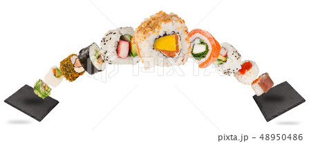 Pieces of delicious japanese sushi frozen in the air. 48950486