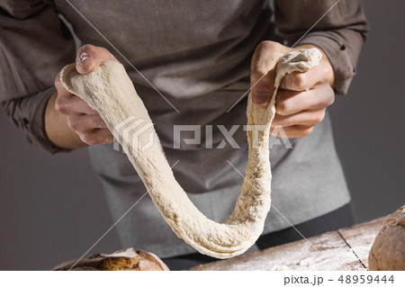 Chef making fresh dough for baking 48959444