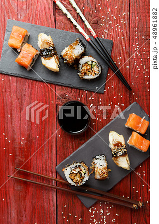Rolls served at red table Rolls served at red table 48961882