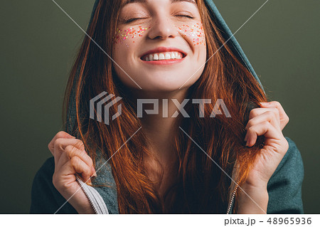 female youth beauty closed eyes toothy smile female youth beauty closed eyes toothy smile 48965936
