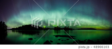 Beautiful northern lights over lake panorama 48966103