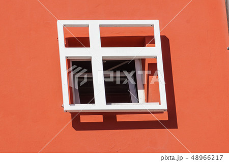 window with iron grating on stone wall window with iron grating on stone wall 48966217