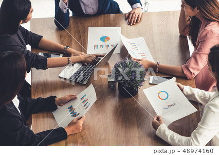 Businesswomen in Meeting, Laptop Computer on Table 48974160