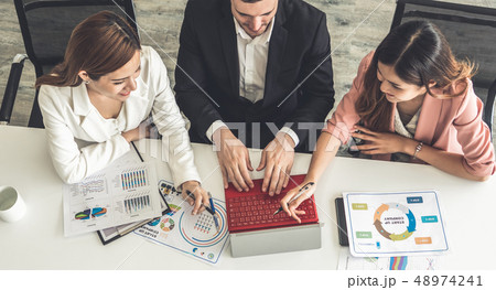 Businessman and businesswomen working in office. 48974241