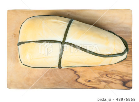 view Provola Affumicata cheese on board isolated 48976968