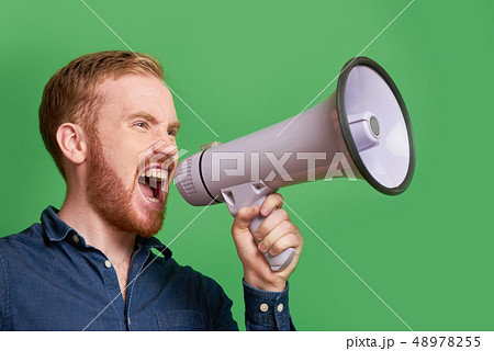 Man screaming in loudspeaker Man screaming in loudspeaker 48978255