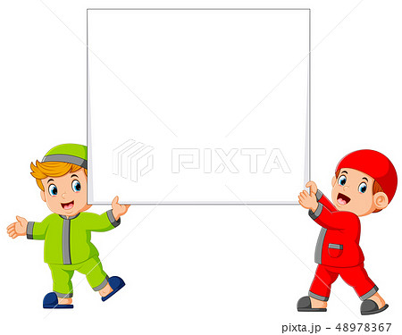 Happy two moslem boy holding big blank sign Happy two moslem boy holding big blank sign 48978367
