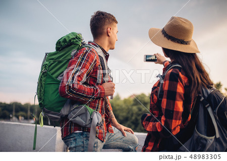 Hikers with backpacks makes selfie on excursion Hikers with backpacks makes selfie on excursion 48983305