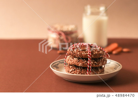 Homemade oatmeal cookies on old table  48984470