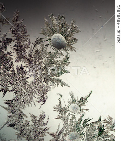 Icy stains on the glass as a background Icy stains on the glass as a background 48985881