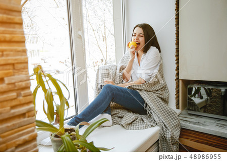 girl near window girl near window 48986955