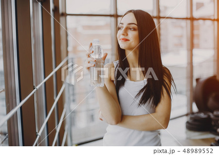 girl in a gym girl in a gym 48989552