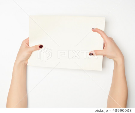 Woman hands on white background. 48990038