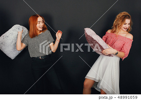 girls withpillows 48991059