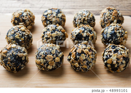 Healthy energy balls made of dried fruits and nuts Healthy energy balls made of dried fruits and nuts 48993101