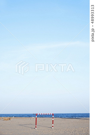 beach soccer goal in a lonely beach. beach soccer goal in a lonely beach. 48993313