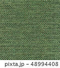 Green textile textured background. 48994408