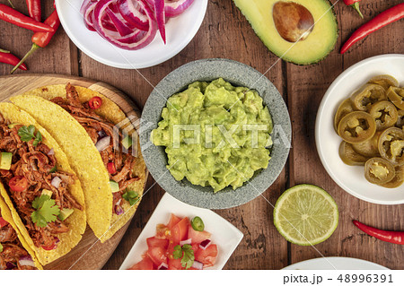 Overhead photo of assortment of Mexican food 48996391