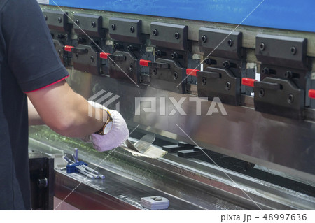 The technician operator use hydraulic bending The technician operator use hydraulic bending 48997636