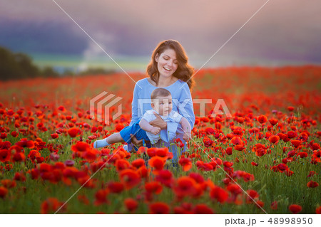 Outdoor portrait. Young mother and her daughter Outdoor portrait. Young mother and her daughter 48998950