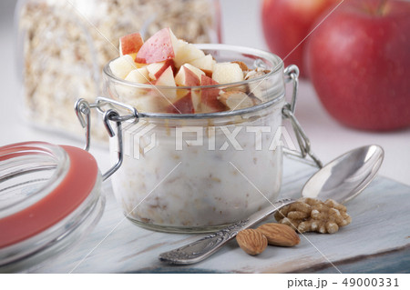 Homemade Bircher Muesli with nuts and apples 49000331