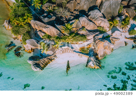 Aerial photo of beautiful famous paradise tropical beach Anse Source D Argent at La Digue island Aerial photo of beautiful famous paradise tropical beach Anse Source D Argent at La Digue island 49002389