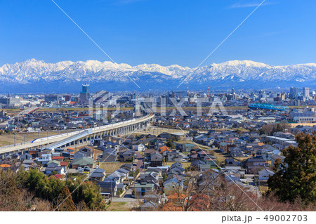 立山連峰・富山市街と北陸新幹線 立山連峰・富山市街と北陸新幹線 49002703