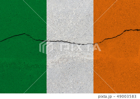Ireland flag on concrete wall with crack Ireland flag on concrete wall with crack 49003583