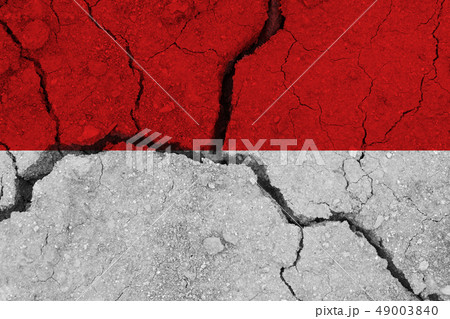 Monaco flag on the cracked earth 49003840