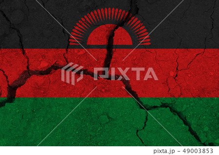 Malawi flag on the cracked earth Malawi flag on the cracked earth 49003853