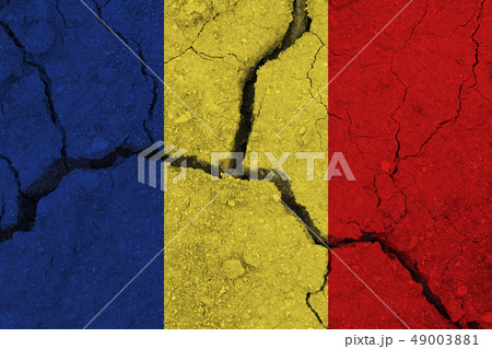 Romania flag on the cracked earth 49003881