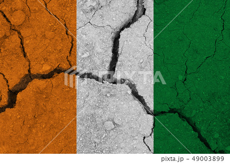 cote d'ivoire - Ivory Coast flag on the cracked 49003899