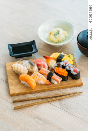 Salmon tuna shell shrimp and other meat sushi maki Salmon tuna shell shrimp and other meat sushi maki 49004666