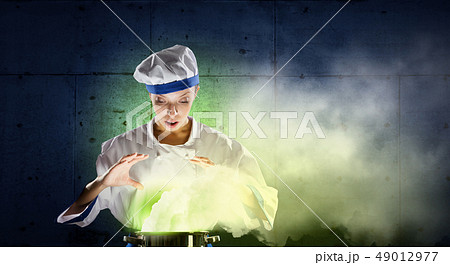She is magician as cook 49012977
