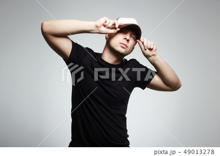 Fashionable Man in Cap. Boy in hat 49013278