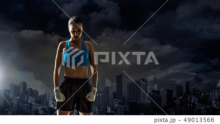 Young boxer woman outdoor Young boxer woman outdoor 49013566