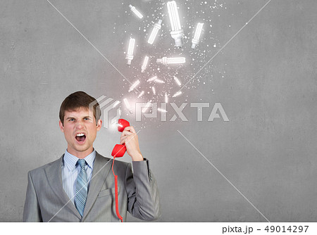 Businessman with red receiver 49014297