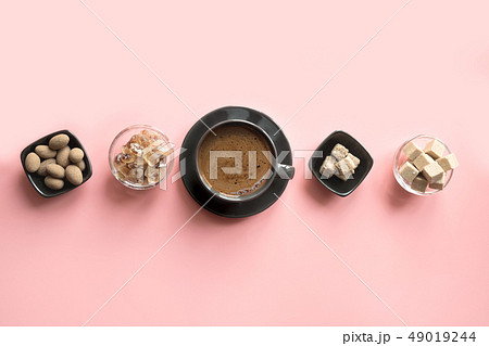Concept of coffee, cacao beans and sugar on pink 49019244