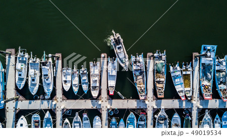 Yacht parking, A marina lot, Yacht and sailboat. Yacht parking, A marina lot, Yacht and sailboat. 49019534