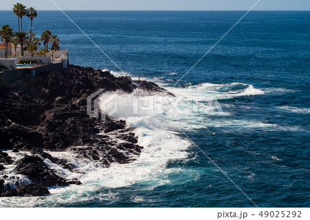 beautiful view on blue ocean water and rocky coast line 49025292