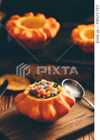 Pattypan squash filled with beef and vegetables Pattypan squash filled with beef and vegetables 49025797